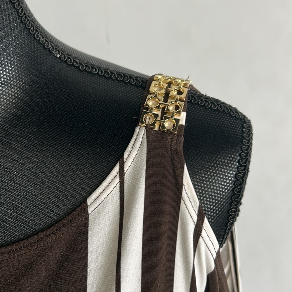 Chico’s cold shoulder tunic. Brown /white. Gold accents. Sz 3(L)
A101 - Picture 3 of 7